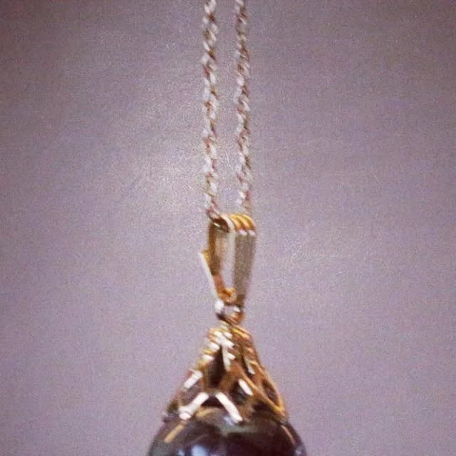 Clear glass form with purple amethyst fragments, 2018 archive photograph